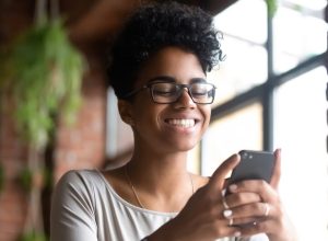 woman happy to receive a good morning text