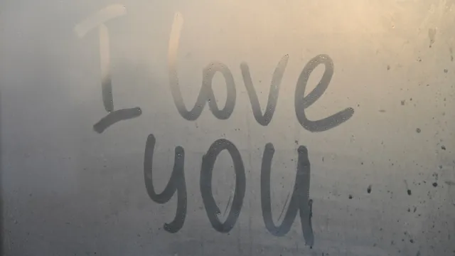 On the misted window the inscription: I love you