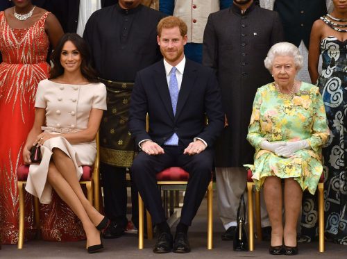 Meghan Markle, Prince Harry, and Queen Elizabeth at the Queen's Young Leaders Awards Ceremony in 2018