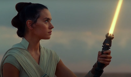 Rey with a yellow lightsaber in "The Rise of Skywalker"