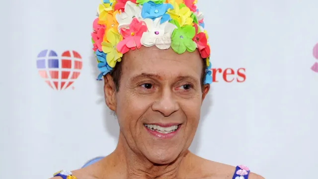richard simmons making a 2013 appearance in a floral swim cap
