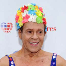 richard simmons making a 2013 appearance in a floral swim cap