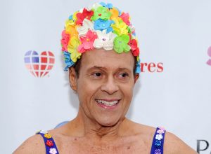 richard simmons making a 2013 appearance in a floral swim cap