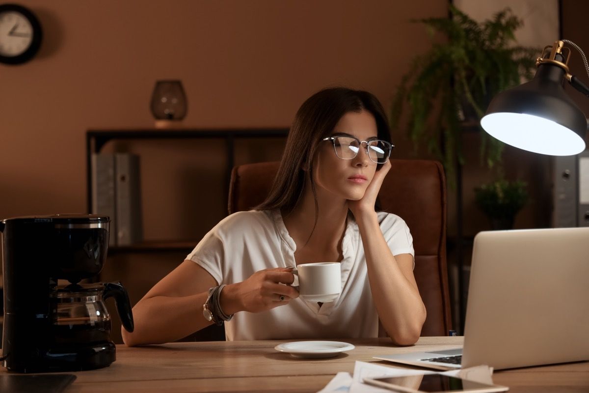 woman drinking coffee in the evening