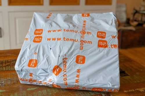 package from Temu sitting on a table