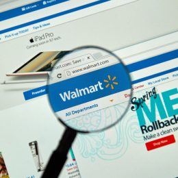 Walmart internet page under magnifying glass.