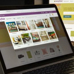 laptop screen showing a person shopping on wayfair