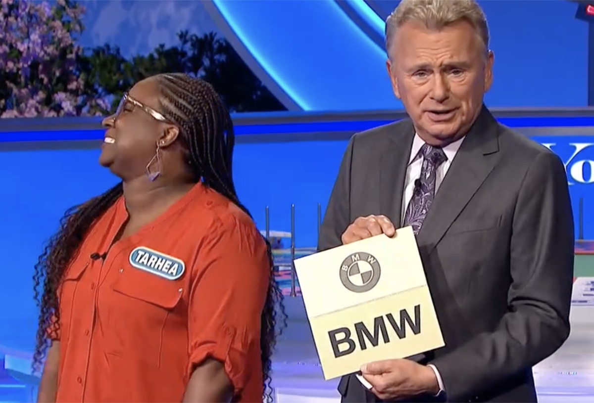 pat sajak holding bmw prize on wheel of fortune
