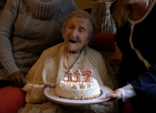 117-year-old woman getting a birthday cake