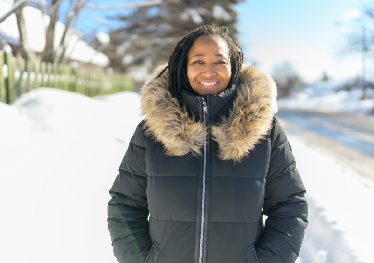 A black woman on winter season with coat