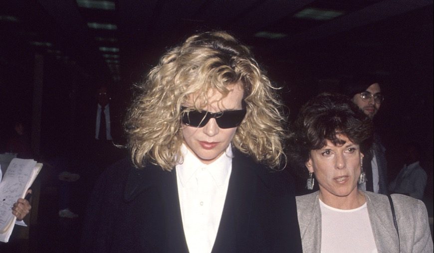 Kim Basinger and her lawyer outside of court in 1993