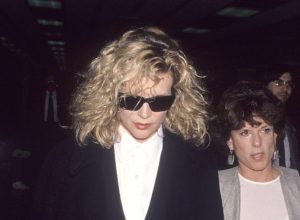 Kim Basinger and her lawyer outside of court in 1993