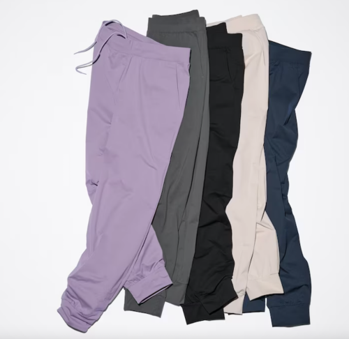 display of Uniqlo joggers in different colros