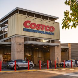 Entrance to a Costco store on a sunny day