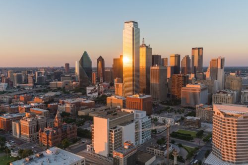 Aerial view of Dallas, Texas city skyline at sunset