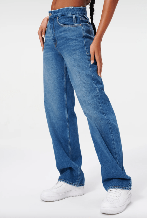 model wearing loose-fitting jeans