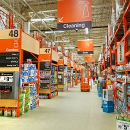 Inside of a Home Depot store showing the cleaning aisle.