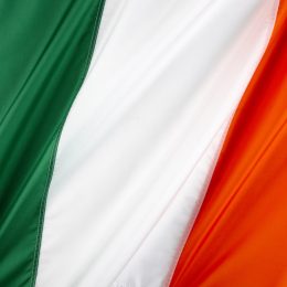 Close up shot of wavy, colorful Irish flag