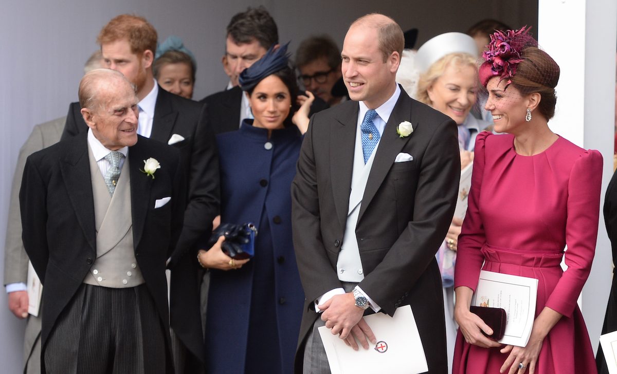 Prince Philip, Prince Harry, Meghan Markle, Prince William, and Kate Middleton at the wedding of Priness Eugenie in 2018