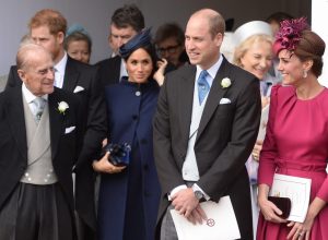 Prince Philip, Prince Harry, Meghan Markle, Prince William, and Kate Middleton at the wedding of Priness Eugenie in 2018
