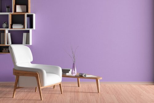 Interior of living room with white leather armchair, wooden triangular coffee table and pink wall. 3d illustration.