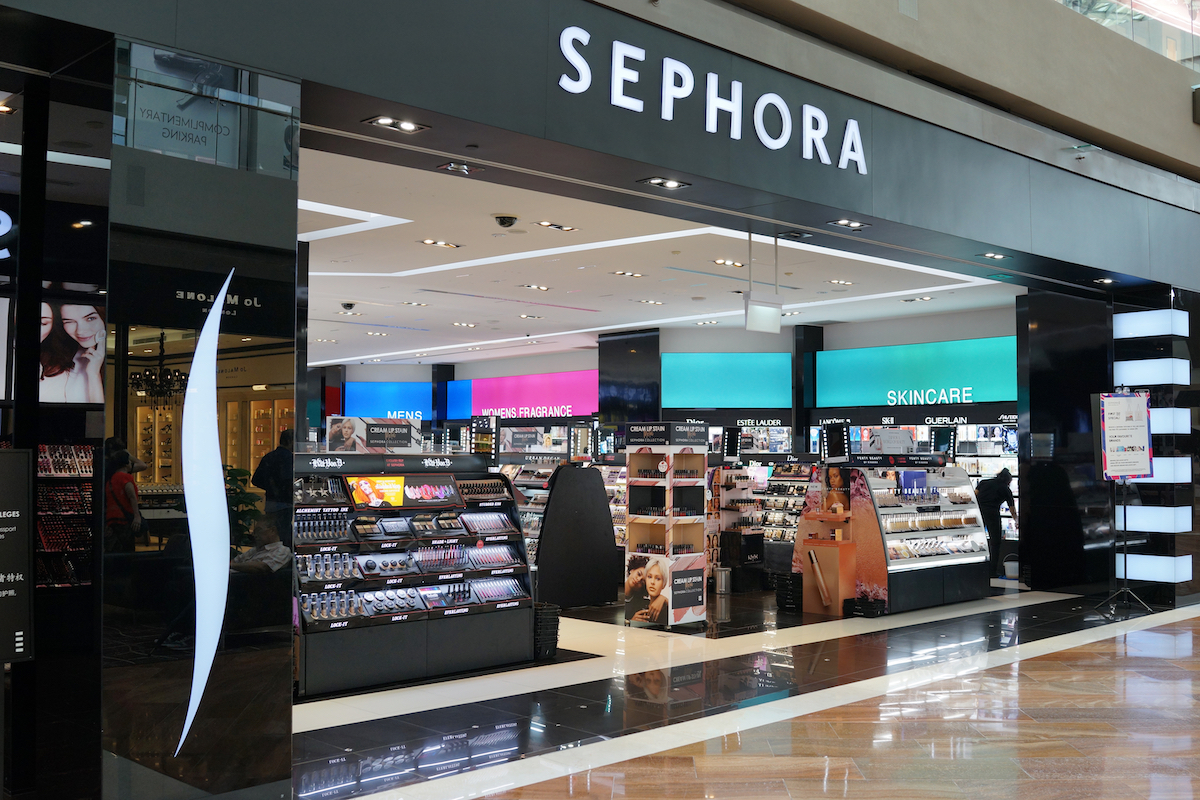 Wide view of the entrance to a Sephora store in a mall.