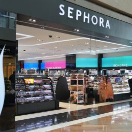 Wide view of the entrance to a Sephora store in a mall.
