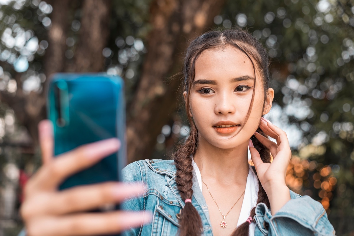 woman taking selfie