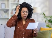woman receives tax bill in the mail