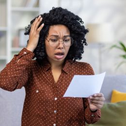 woman receives tax bill in the mail