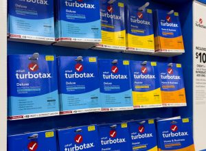 A rack of TurboTax programs for sale in a store