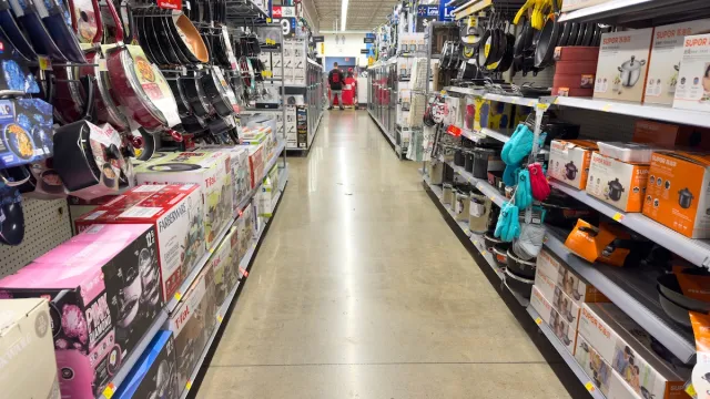 Wide view of kitchenware department isle at Walmart store.