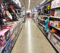 Wide view of kitchenware department isle at Walmart store.