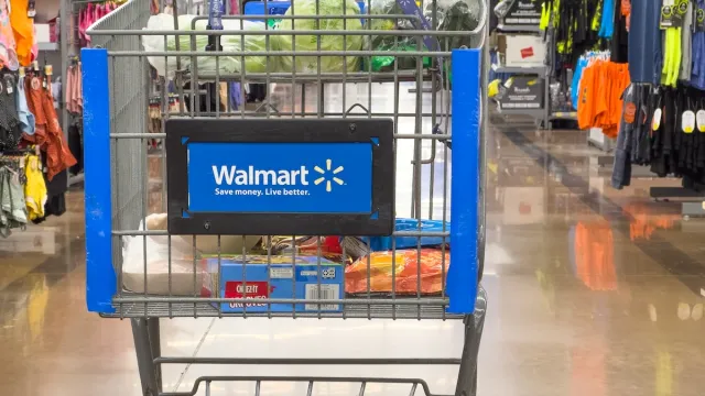 Closeup of an almost empty shopping cart inside local Walmart