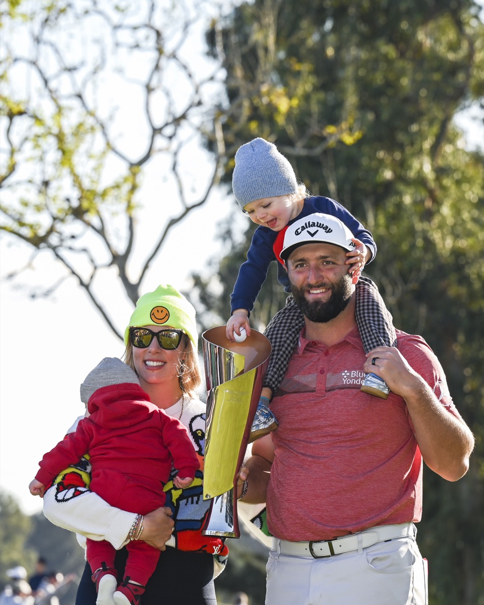 Kelley Cahill, Jon Rahm, and their two children in 2023