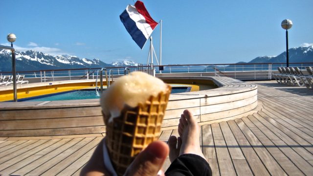 Man holding ice cream on cruise ship deck