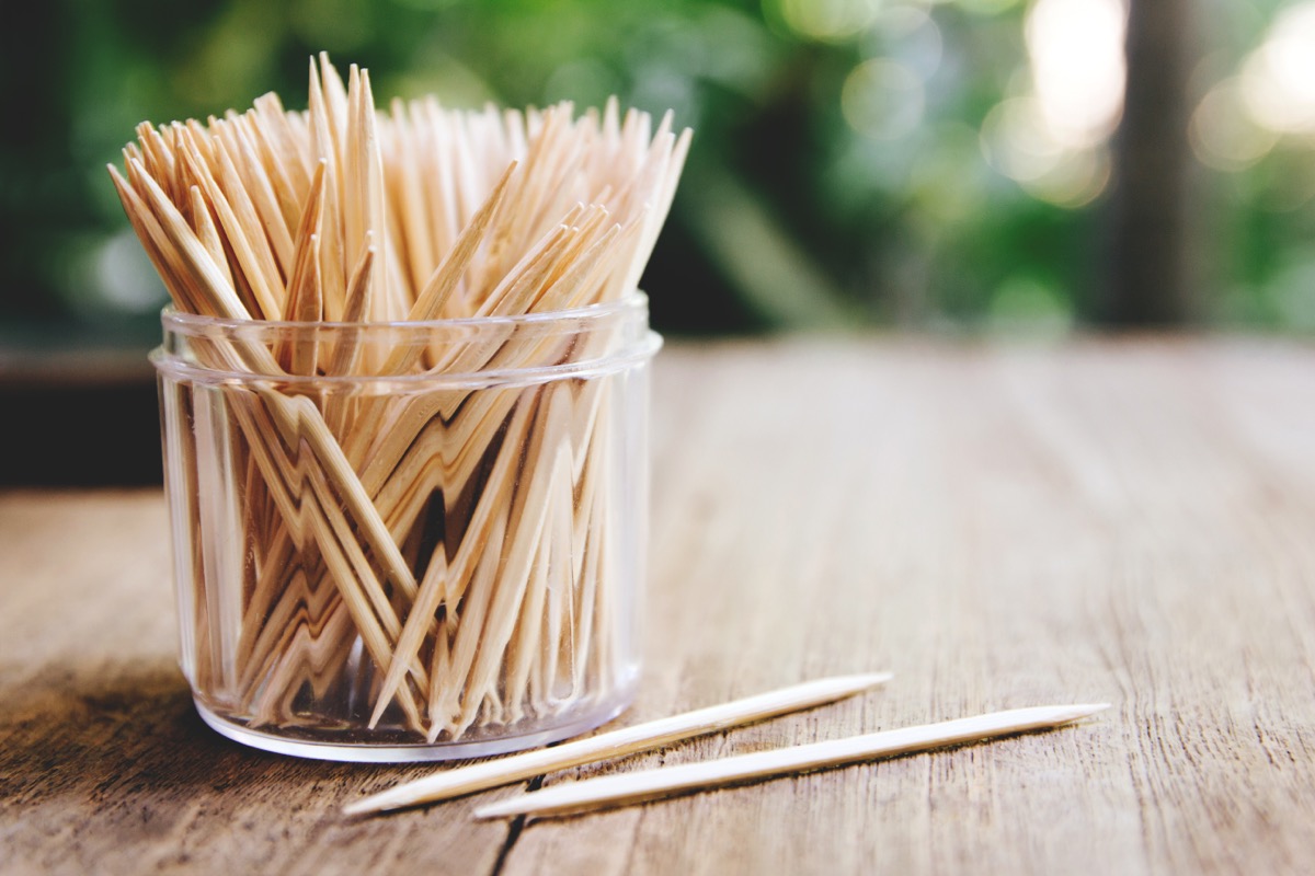 Toothpicks on wooden table