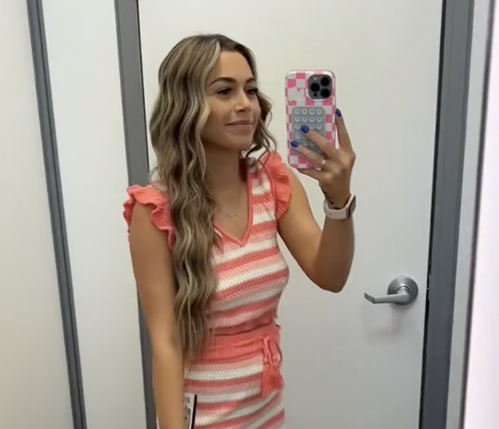 Female shopper trying on spring and summer clothing at Walmart