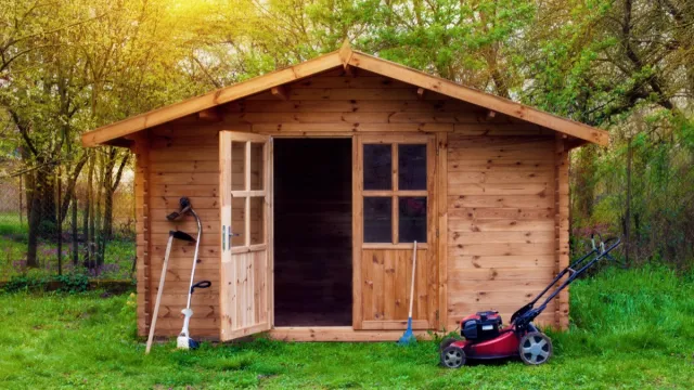 A wooden shed in a backyard