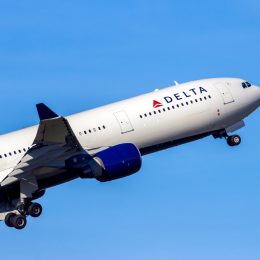 A close up of a Delta Air Lines Airbus A330 taking off.