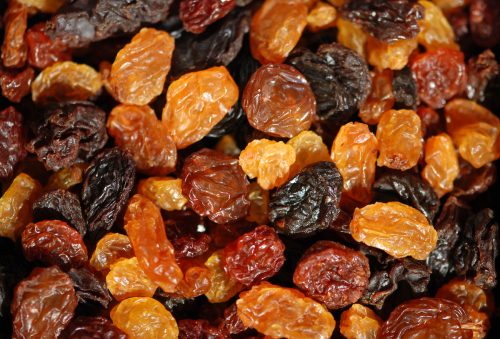 close up of different colored raisins