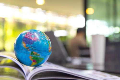 World globe on text book.