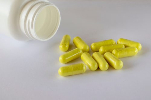 quercetin supplements next to jar
