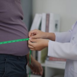doctor taking measurements
