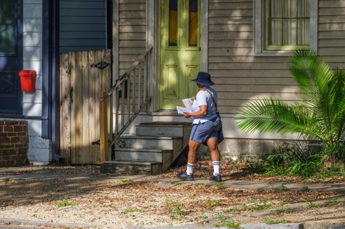 Mail Carrier Delivering Mail on Napoleon Avenue