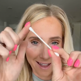 Makeup artist Lauren Hale posing with a Q-tip