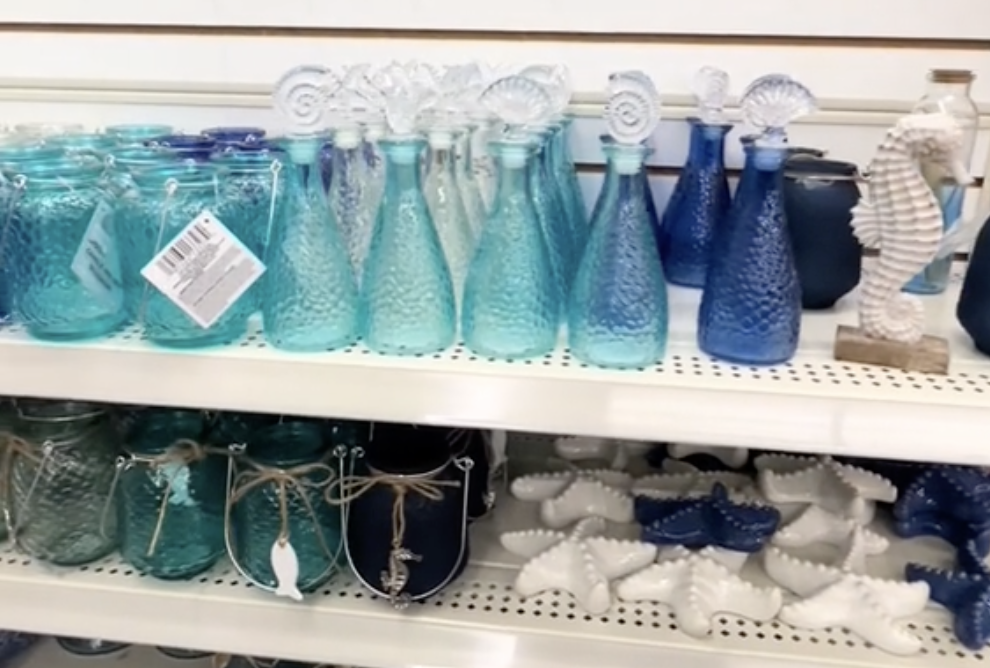 Display of blue glass decor at Dollar Tree