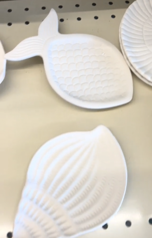 White ceramic shell and fish dishes