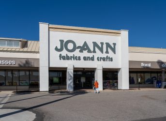 Sarasota, Florida, USA - January 11, 2022: A Woman walking into the JOANN Fabrics and Crafts store in Sarasota, Florida, USA. Jo-Ann is an American specialty retailer of crafts and fabrics.