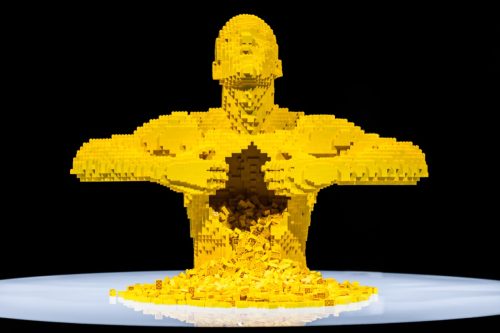"yellow" lego sculpture by artist Nathan Sawaya.
